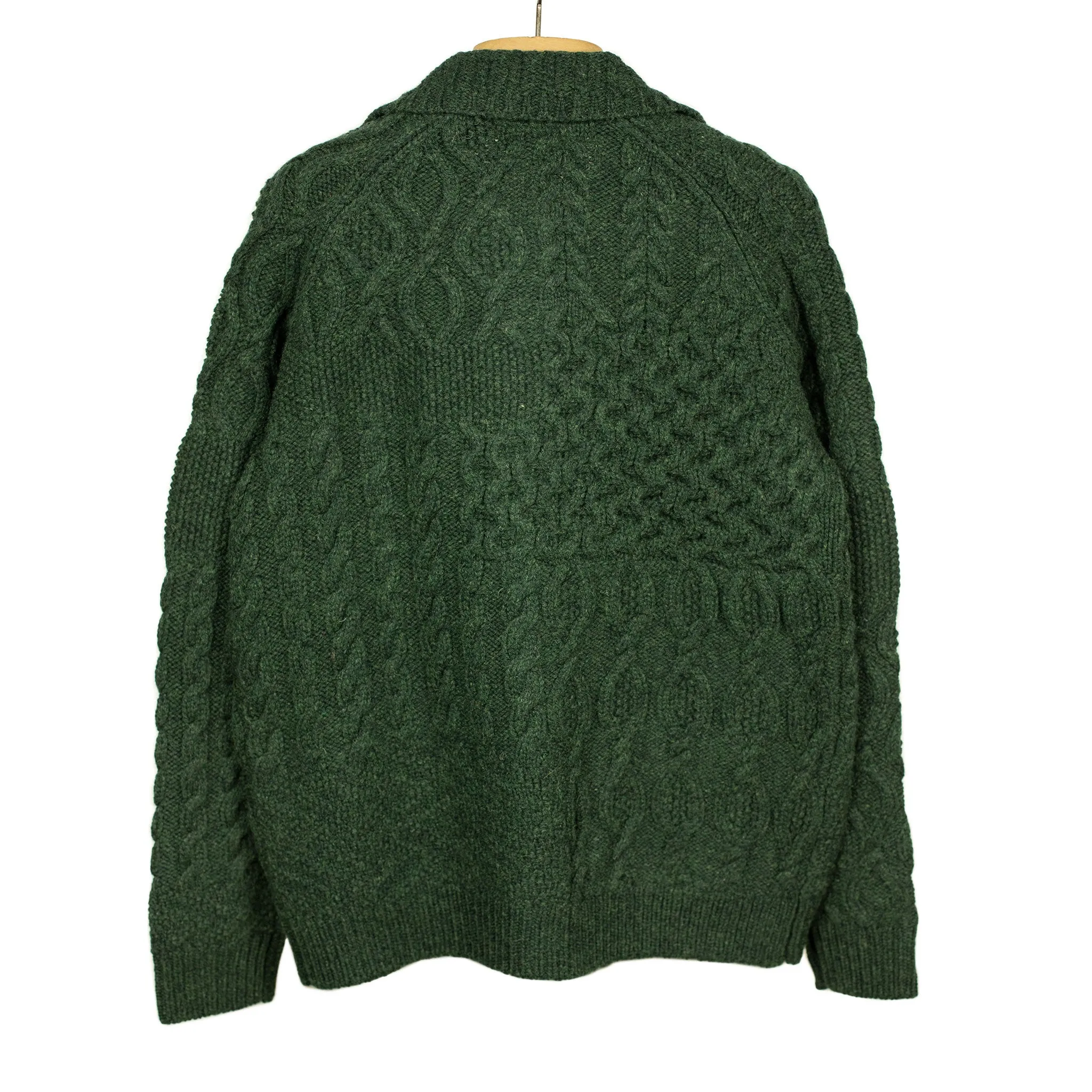Crazy cable knit Aran cardigan in racing green wool