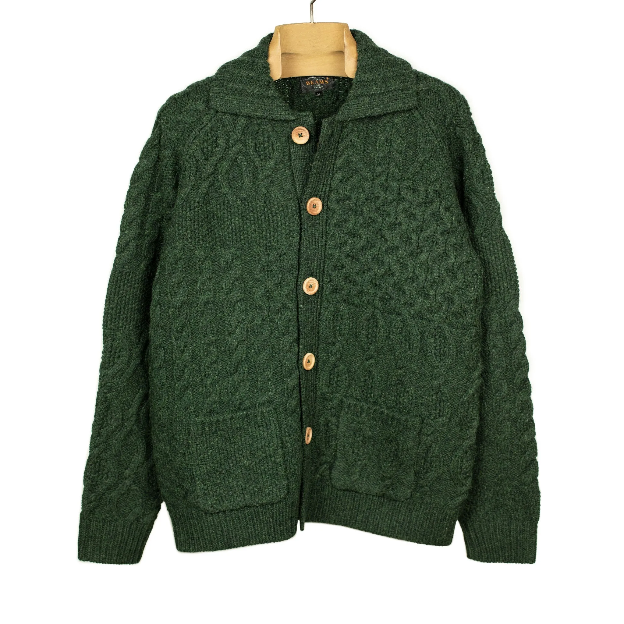 Crazy cable knit Aran cardigan in racing green wool